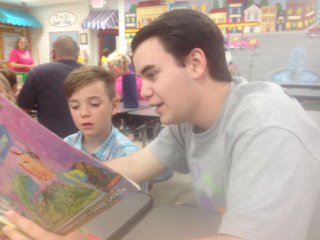 BCSRead20's tweet photo. @BradleySchools high school volunteers took the opportunity to read to upcoming Kindergartners at Kindergarten Rocks https://t.co/QWAlS0NKaG