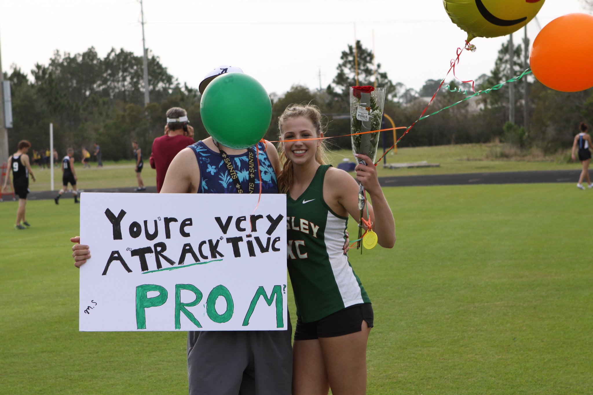 “Mosley hurdler @og_harrell gets her promposal during County meet! #finfast...