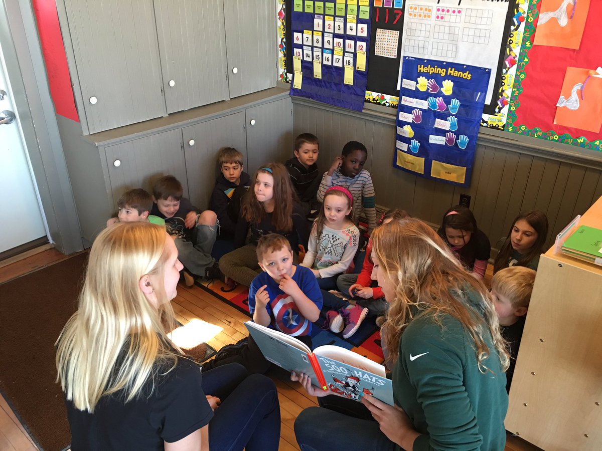 MSU_SASS's tweet photo. A day full of laughs &amp; smiles at Strange Elementary w/ Marina &amp; Emily (@MSUswimdive 🏊)  #MarchIsReadingMonth 📚📚 https://t.co/fhQlKJKXRc
