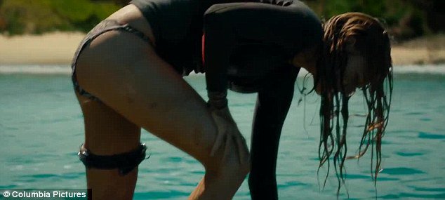 DailyMailCeleb's tweet photo. Blake Lively in trailer for The Shallows is bloodied and stranded as sitting shark prey https://t.co/VzgiGP6YNa https://t.co/ipQhihwCiy