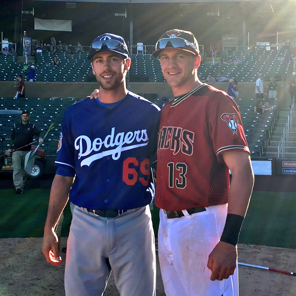 Dbacks's tweet photo. .@NickAhmed_ and his brother Michael catch up after today's #DbacksSpring game. https://t.co/S2hc6bPDYK
