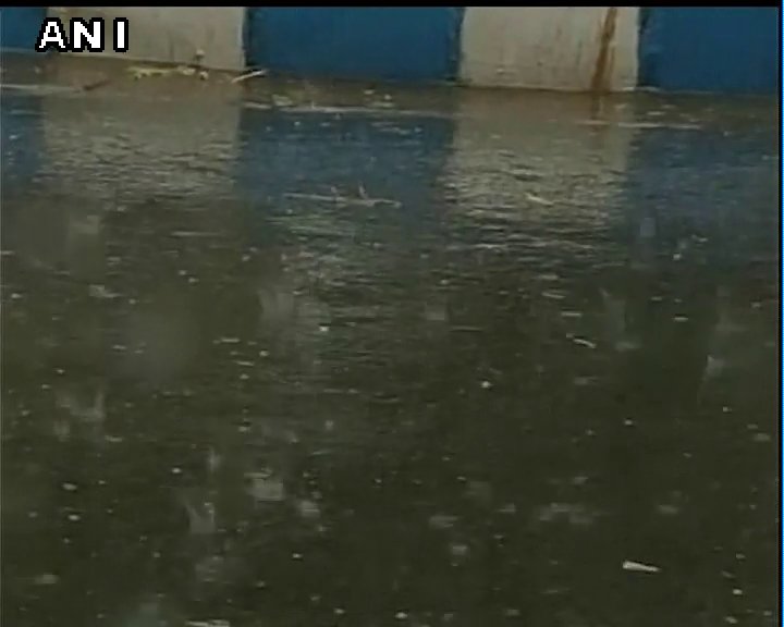 ANI's tweet photo. It starts raining again in Kolkata #IndvsPak #WT20 https://t.co/O0WnEEJbef