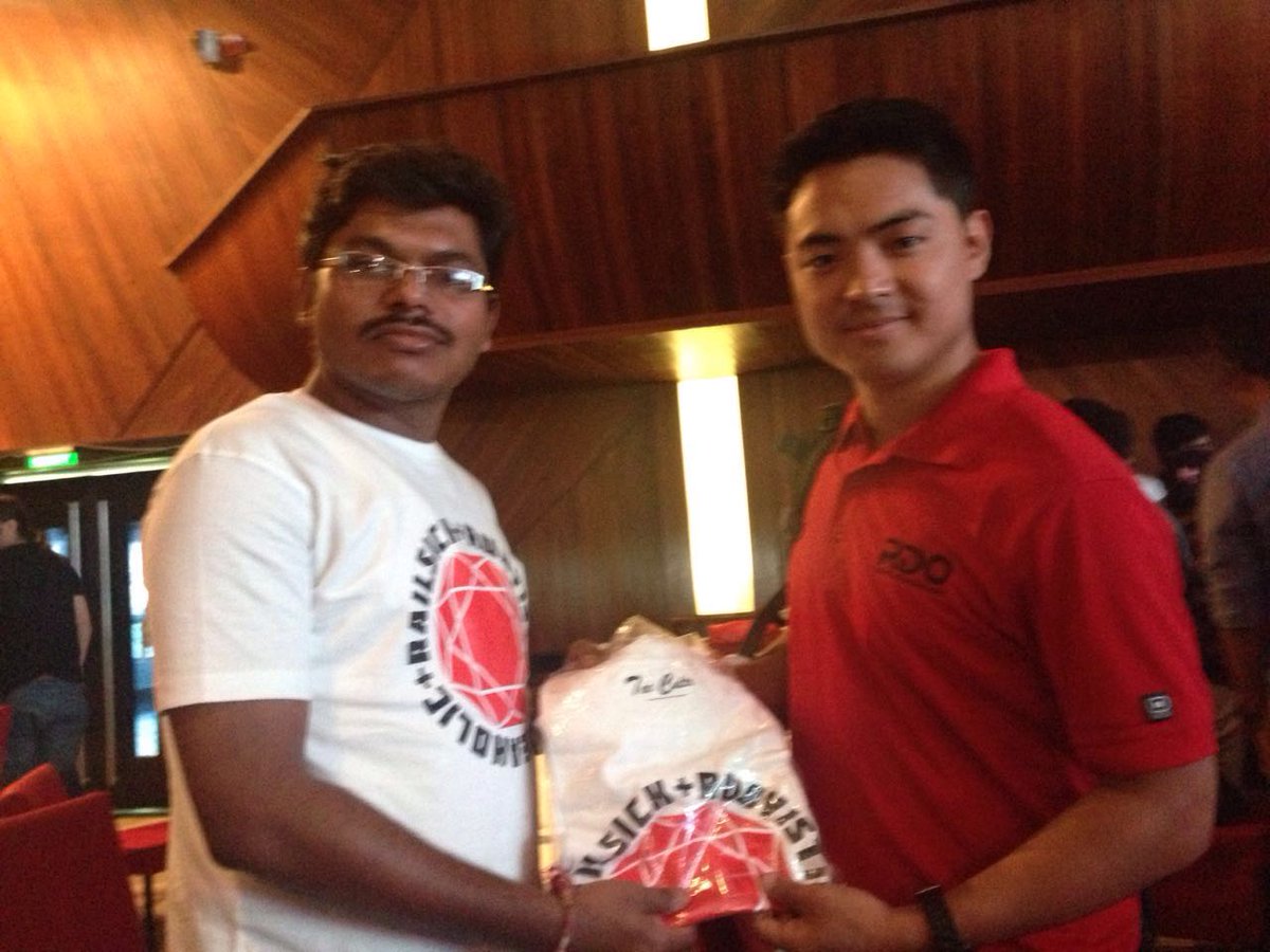 Cybrilla's tweet photo. Cyborg @NiSuSam having the joy of giving the Rubyist Tee to @budhrg. Get Yours! #RubyThing #RubyConfIndia https://t.co/md8JCaLRSE
