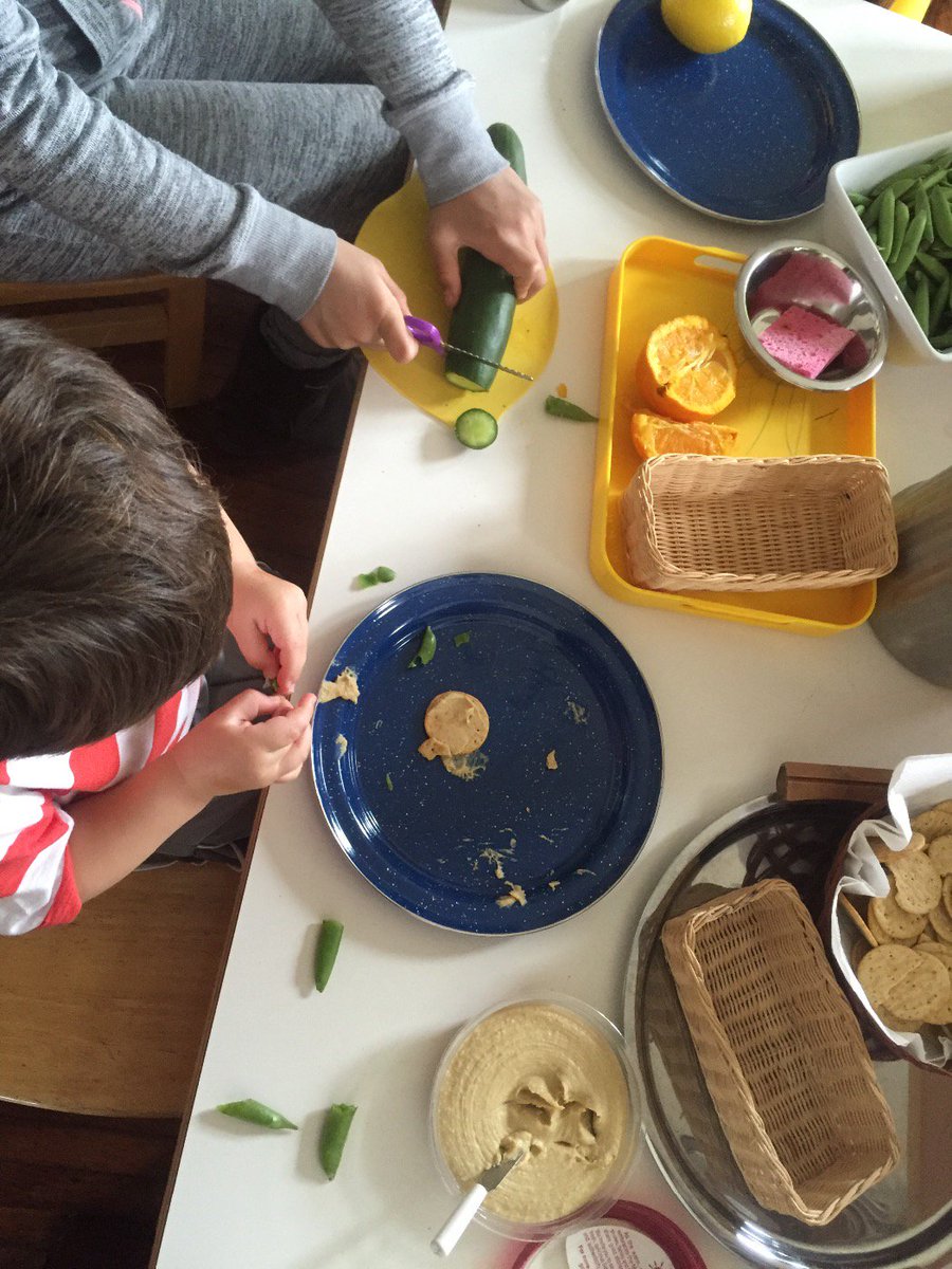 Mimmy &amp; me: cutting fruit for LOC water, spreading hummus, and getting peas out of pods. #PracticalLife #montessori