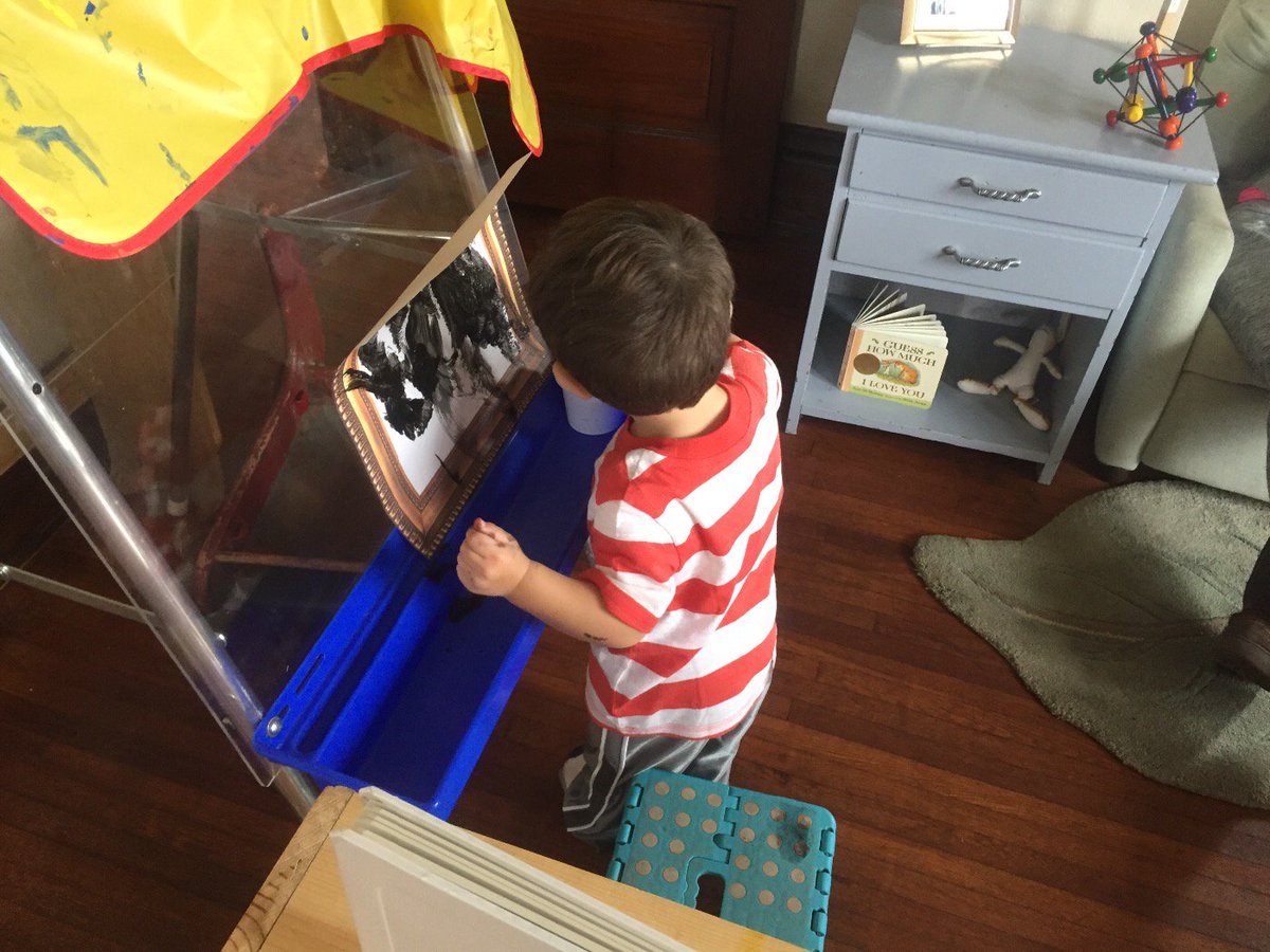 Painting at the easel. #art #montessori