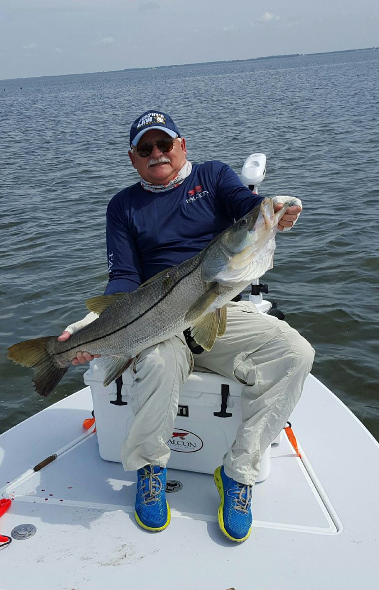 FlatsClass's tweet photo. @FalconRods field tester, Tim Wallace, was fishing Charlotte Harbor this week and caught this #monstersnook! https://t.co/vzXIMYLSok