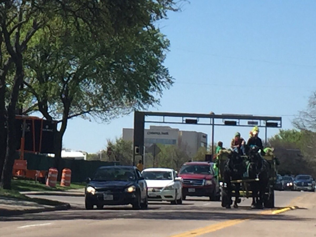 Share the road takes on a whole new meaning <a href="/DallasStPats/">Dallas St. Patrick's</a> #horse #carriage #StPats