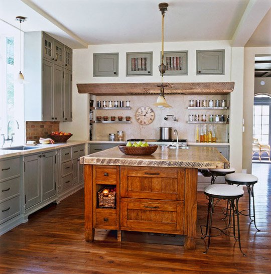 traditionalhome's tweet image. #PinoftheDay: Slices of wood stained in subtly different hues are grouted like tile for the range backsplash.