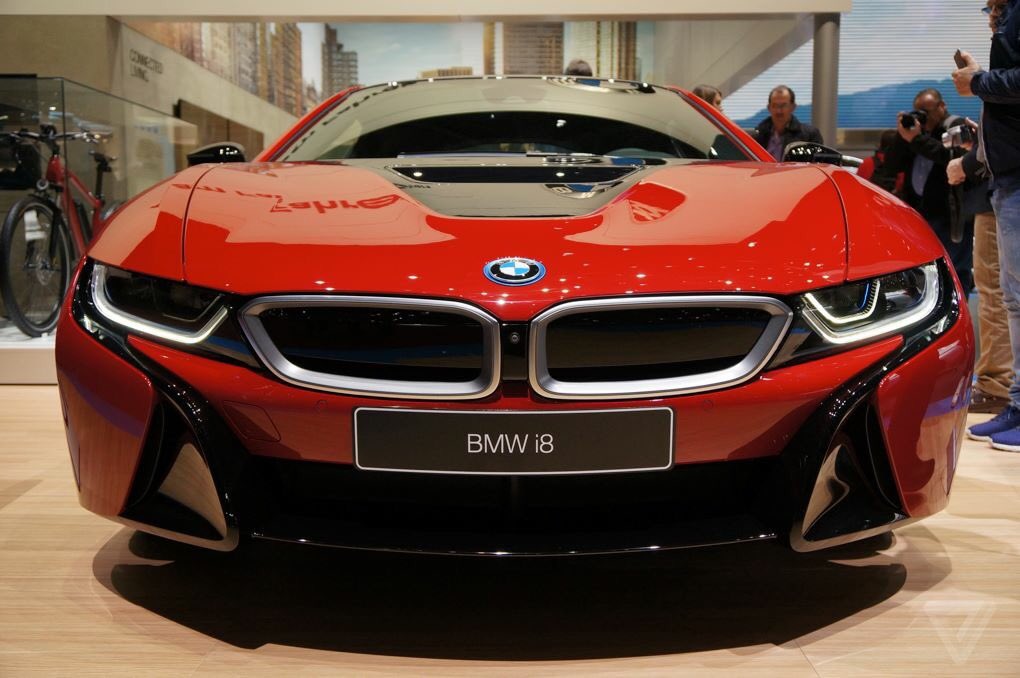 BMWMelbourne's tweet photo. The limited edition Protonic Red #BMW #i8 dazzles at the #Geneva Motor Show. What do you think of this red beast? https://t.co/6pmahMSNFM