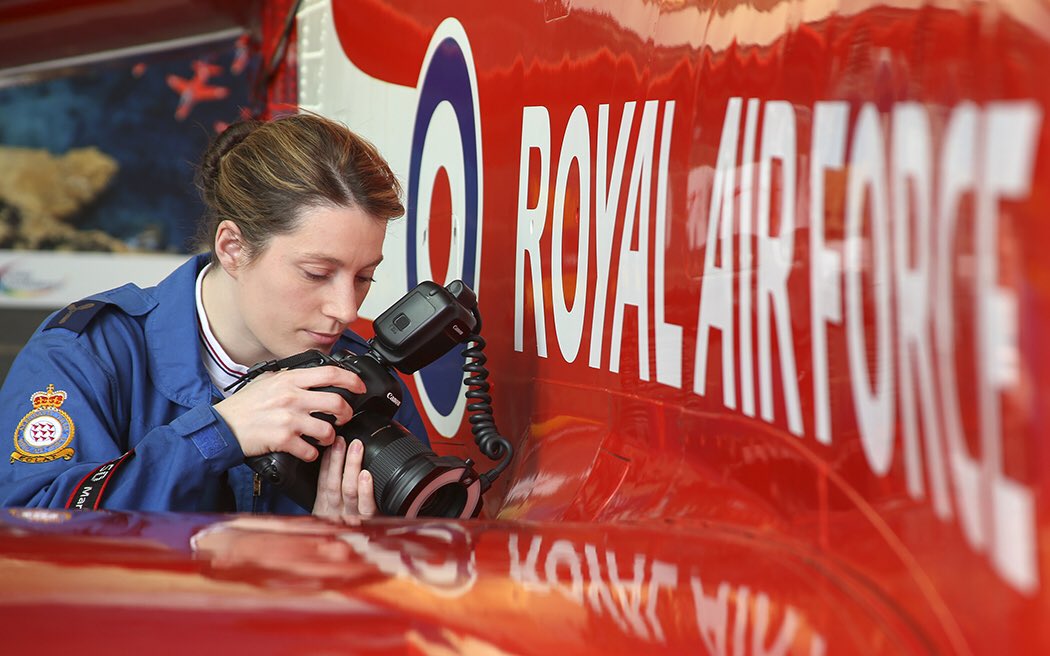 It's International Women's Day. This is RAF Red Arrows photographer SAC Gina Edgcumbe at work. #IWD2016
