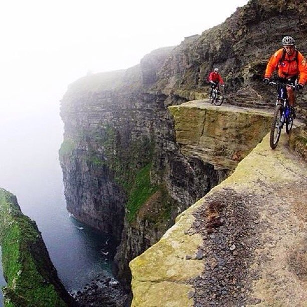 wanderireland's tweet photo. This risky shot by @nyanjess is from #doolin in #Clare near the infamous #cliffsofmoher #ireland https://t.co/trFRmamUVU
