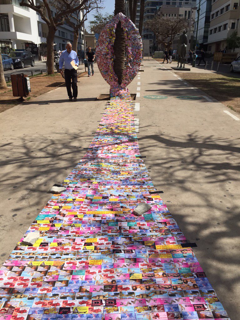 InternationalWomensDay #TelAviv protest sculpture made from prostitute cards  the city is plastered with, image size:768x1024