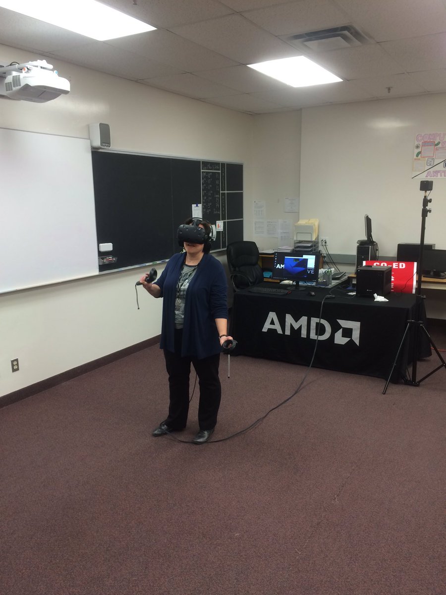 MrShannon6's tweet photo. Ms. McDonald trying out the HTC Vive. VR is better then French Class. @TCPHSUpdates @AMD https://t.co/GuzDJMw6aZ