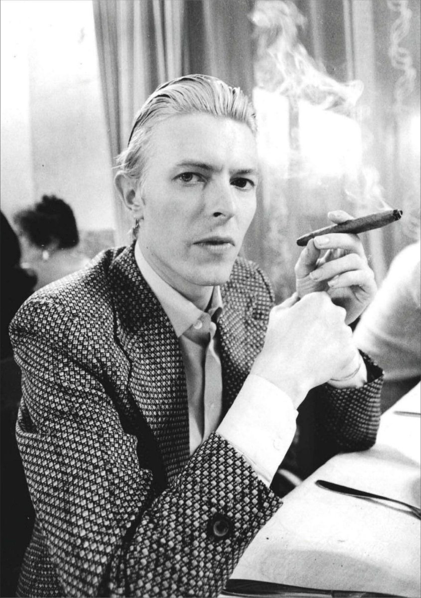 david bowie smoking a cigarette David Bowie smoking a cigar at the Metropole Hotel, Moscow, 1976 by Andrew  Kent #USSR #Russia #Low