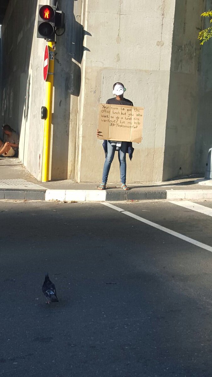 iamSivN's tweet photo. Just spotted these guys with monkey masks at the robots in the cbd? #tasksmustfall https://t.co/StA1RuwxHU
