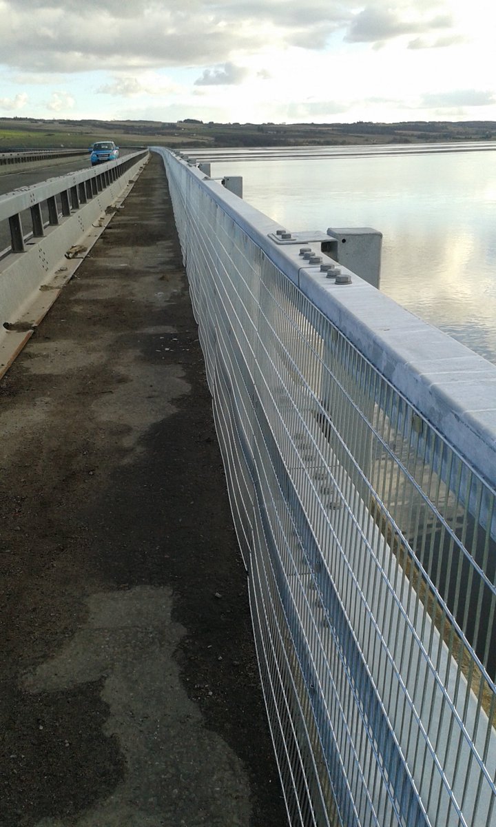 NWTrunkRoads's tweet photo. Pic of newly installd parapets on #A9 #CromartyBridge &amp;team wrking frm barge on scour repair https://t.co/nmPRkWSzMt https://t.co/5Xsd9sq3yH