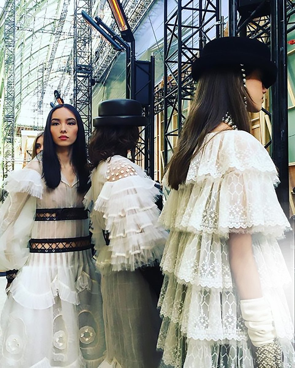 CHANEL's tweet photo. Ruffles &amp; Lace: pleated chiffon, tulle ruffles and cream lace contrast with black leather lace #ChanelFallWinter2017 https://t.co/BxpQxu0yMu