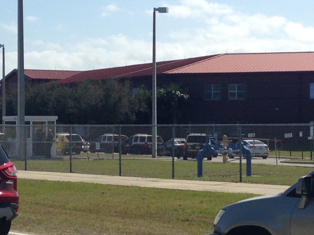aobrien7's tweet photo. Very large law enforcement present at Matanzas High School. Photo by @BrittanyJNews13 https://t.co/eCrXQdUcXK
