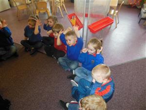 Springside Nursery playing 'les oreilles de lapin'! Great counting in French.