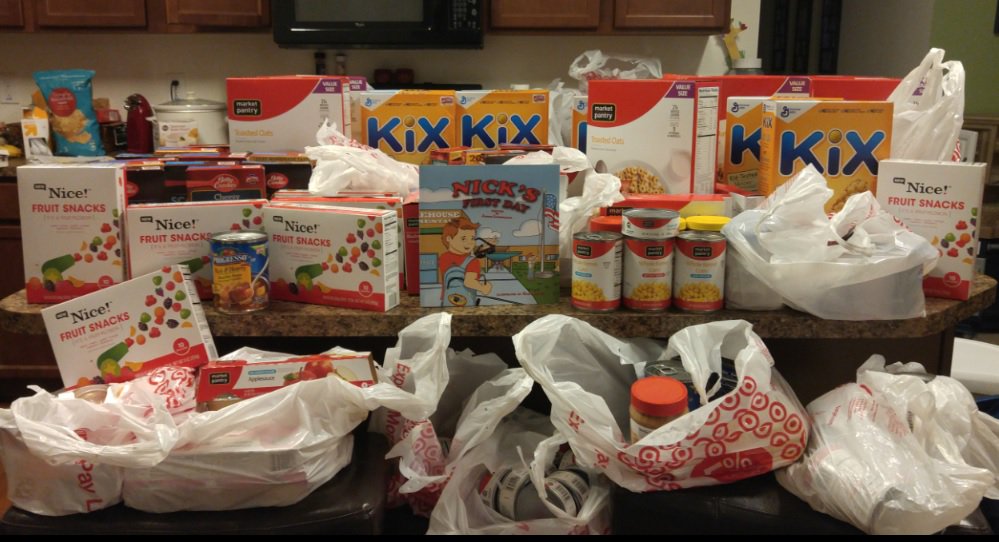 NickBooksUSA's tweet photo. Food going to local children that won't be getting food over Spring Break as well as a book thanks to books sold. https://t.co/qIsUhz9X7H