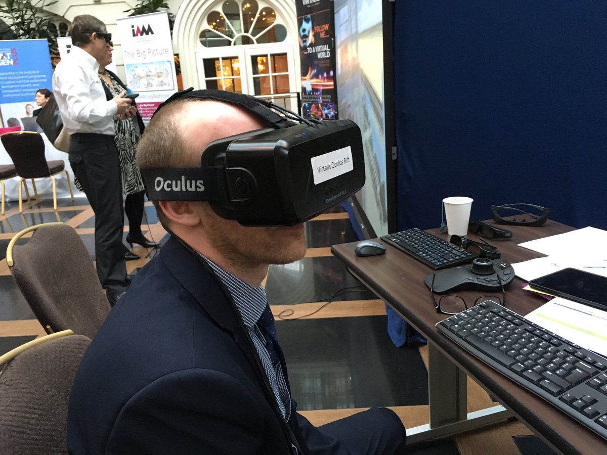 Virtalis's tweet photo. IAM representatives using the Oculus Rift at the @IAMXchange #IAMEx #VR https://t.co/N6PJRgecQO