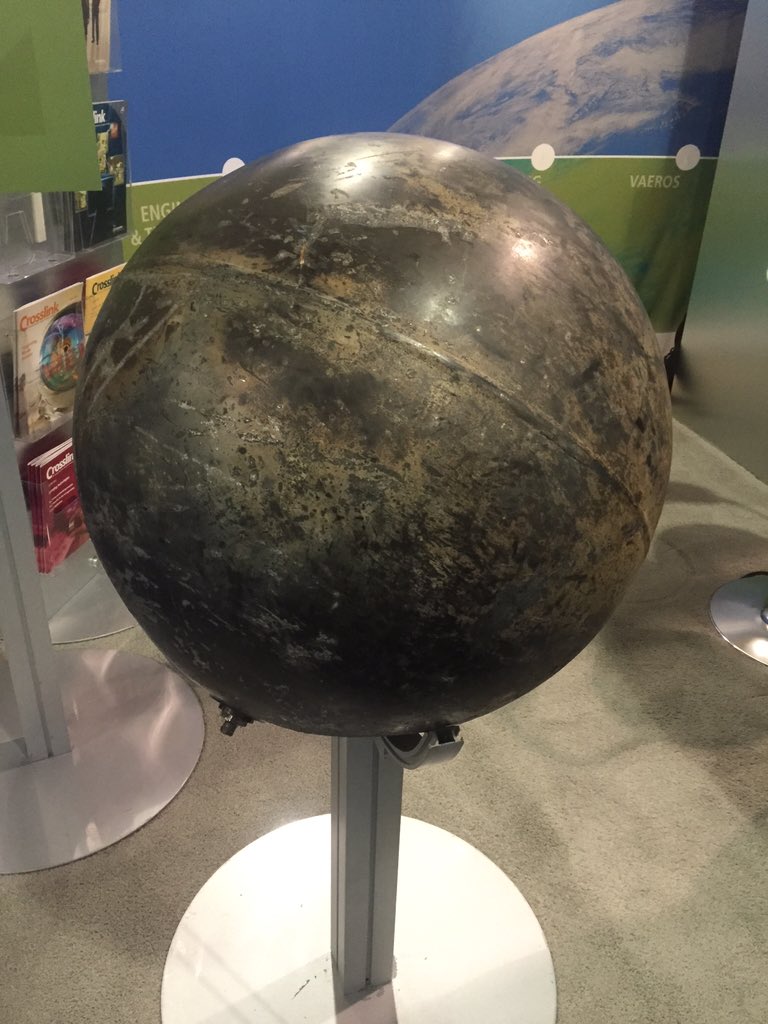 mdaneman's tweet photo. A 67-lb piece of debris from a 1996 Delta rocket launch that landed in a farm field. Neato. #satshow2016 https://t.co/acUn4VLA3H