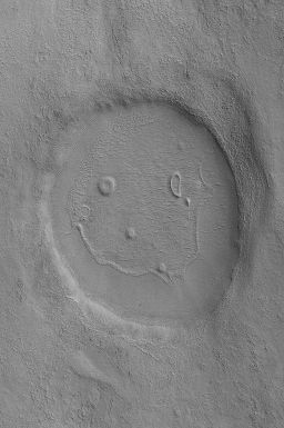 web_facts's tweet photo. There is a crater on Mars in the shape of a happy face. https://t.co/Ude3qd1OrC