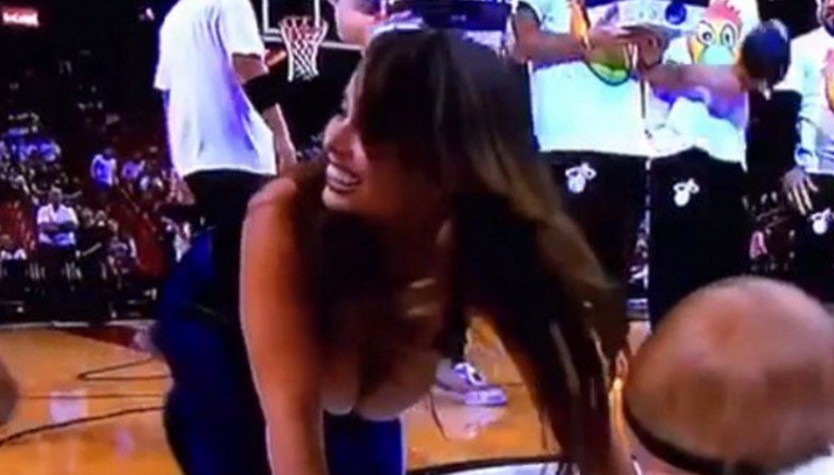 TPS on X: Miami Heat Fan's Boobs Almost Fall Out of Her Top During  Halftime Baby Race (Video)    / X