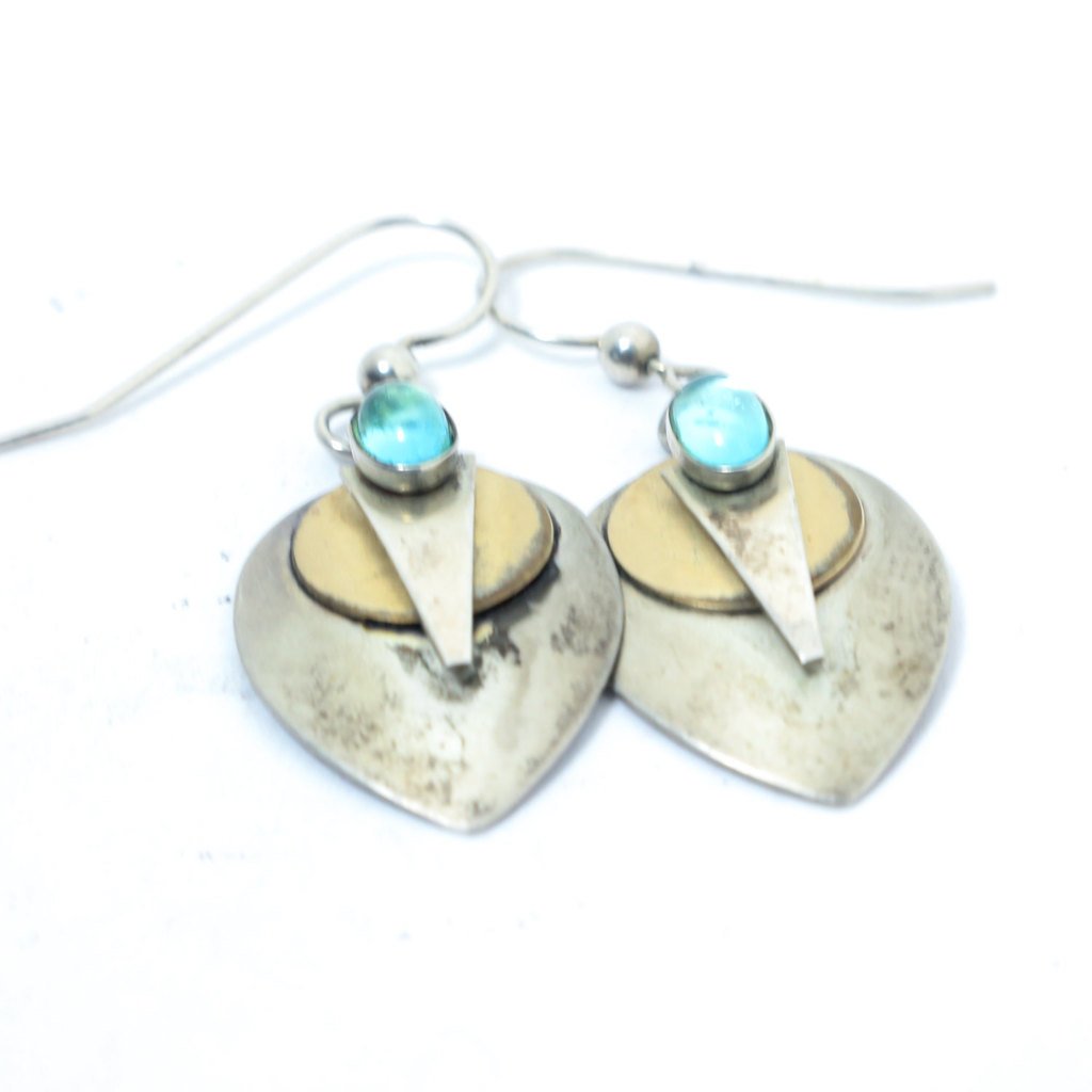 SavedFtF's tweet photo. New from #SavedFtF! #etsy https://t.co/Da62XQnh7H - Abstract Silver Teardrop Earrings with Copper Circles Long Sil… https://t.co/8hOVkPowp8