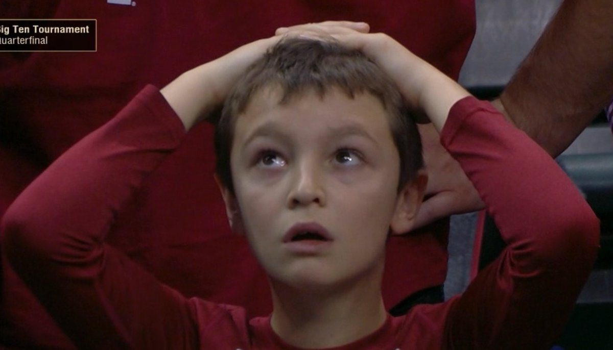 SportsCenter's tweet photo. Indiana fans are stunned. Michigan hits back-to-back 3-pointers to beat the Hoosiers. https://t.co/wJtpEaq0op