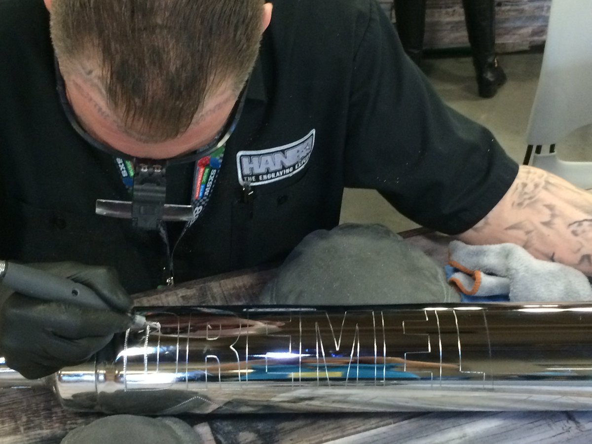 dremel's tweet image. Check out @hanrostudios hard at work engraving an @IndianMotocycle Chief Vintage at Dremel booth #401. #SXCreate
