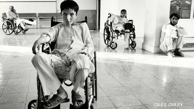 bbcworldservice's tweet photo. "I have one shot...basically eye level" - photographer @gilesduley after losing both legs 📻https://t.co/B6MRfZlkGP https://t.co/vWzBfD4qRF