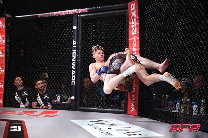 RFAfighting's tweet photo. #PhotoFriday: @DanHitman unleashes the rare "Levitation Slam" last Friday at #RFA36.
Photo π·: #JesseKelley.
#MMA https://t.co/SxPtLeeyqH