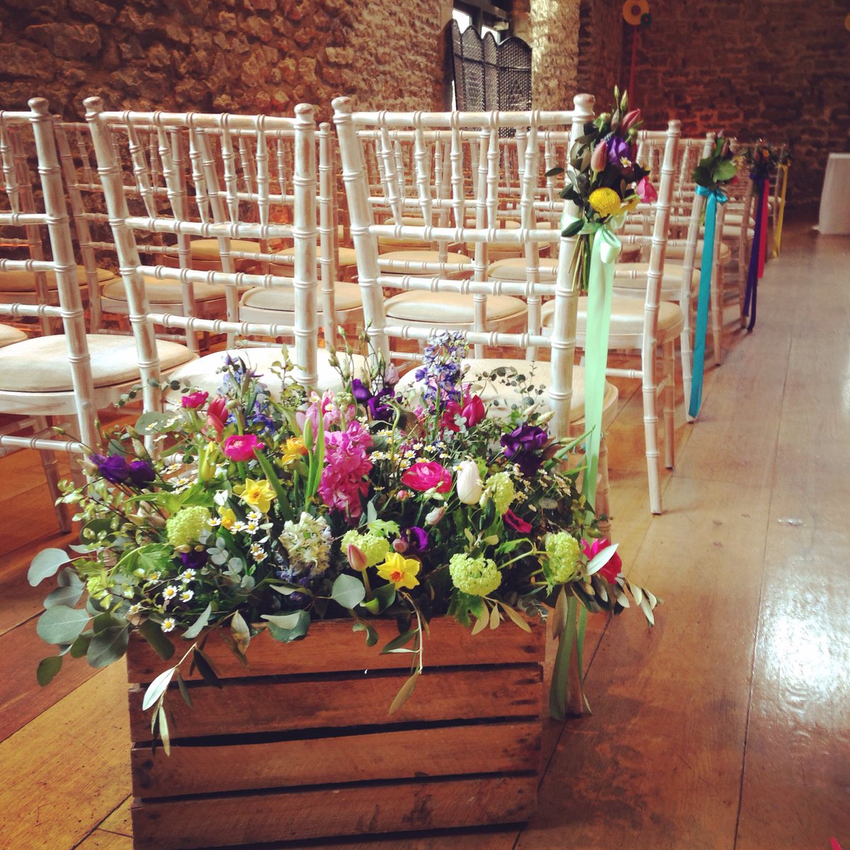 Love these crates from <a href="/NortonFlowers/">Emma Norton Flowers</a> filled with Spring flowers Will be reused as table plan after ceremony!! 💕