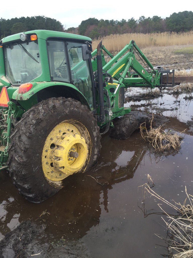 BrittMBoyd's tweet photo. No it's not wet. #bringachain #stuckdeere https://t.co/wv7CVHMNLy