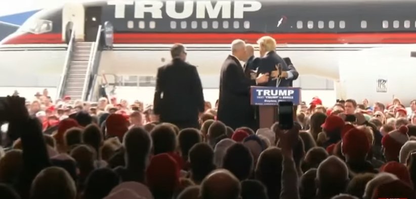 Progressive rushes poodium, grabs Trump's leg in Dayton (VIDEO)