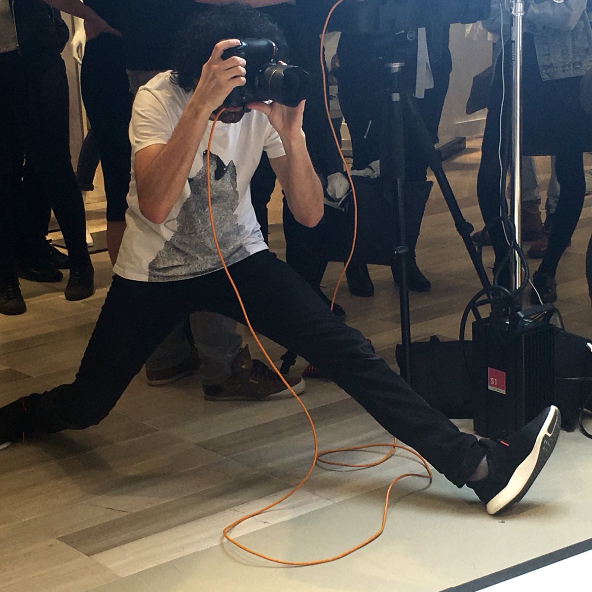 ElleCanada's tweet photo. Our photog Evaan Kheraj doing his signature yoga-snap pose on our live shoot @SAKS_QUEENST #ecmodelsearch https://t.co/hcgc5oVXkw