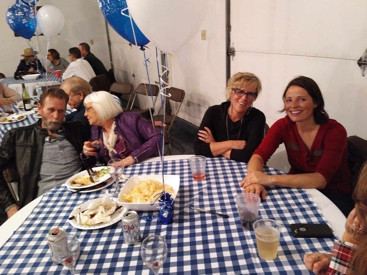 Another great picture of people enjoying themselves at Brian Hugh's 65th birthday party. Congratulations Brian