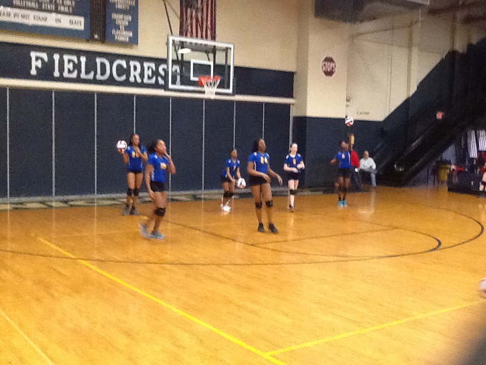 Parker 7th grade volleyball team warms up before the IESA quarterfinal game.
