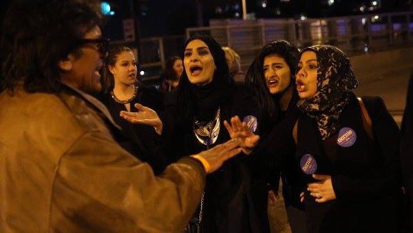 lsarsour's tweet photo. American Muslim women confronting hateful Trump supporters in Chicago. Is this what you all mean by oppressed? https://t.co/0TdWwBEF6m