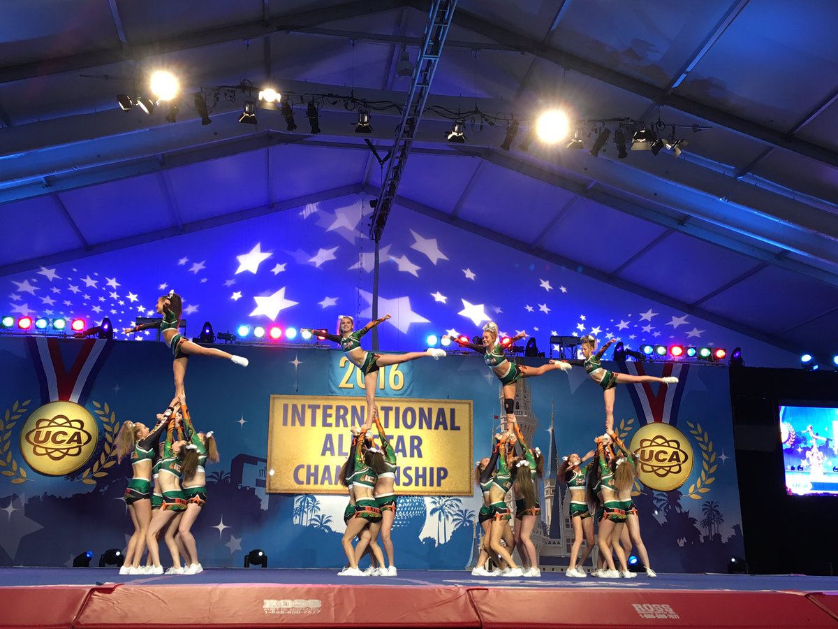 UCAupdates's tweet photo. Arabesques and unique pyramid transitions by Iowa Eilte Cheer- Senior Slayers  #UCAallstar https://t.co/EofE0w0MZE