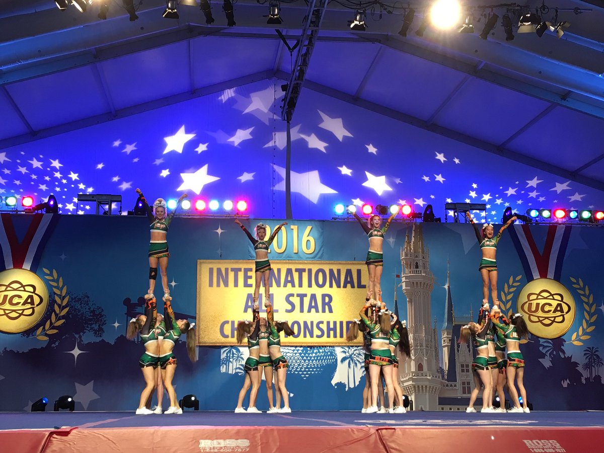 UCAupdates's tweet photo. Arabesques and unique pyramid transitions by Iowa Eilte Cheer- Senior Slayers  #UCAallstar https://t.co/EofE0w0MZE