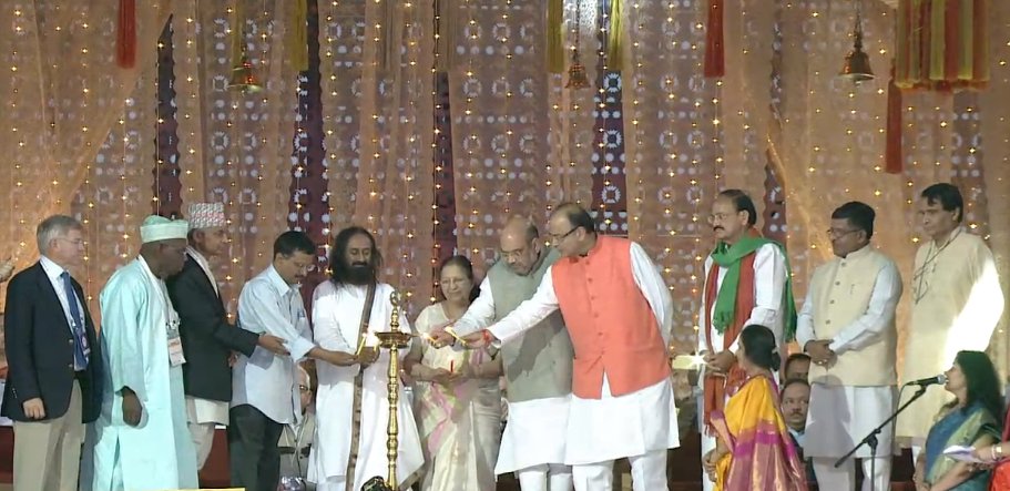 ArtofLiving's tweet photo. Lighting the lamp of 'Service' with dignitaries on the dias &amp; 3.5 million from 155 countries on #WCFDay3! https://t.co/Skq0Bkmhsg