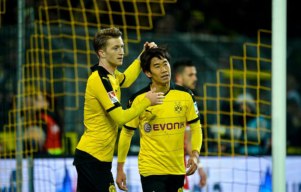 EuropaLeague's tweet photo. Dortmund move within five points of Bundesliga leaders Bayern as Marco Reus &amp; Shinji Kagawa net in 2-0 win. #UEL https://t.co/KpXCnPh7mF