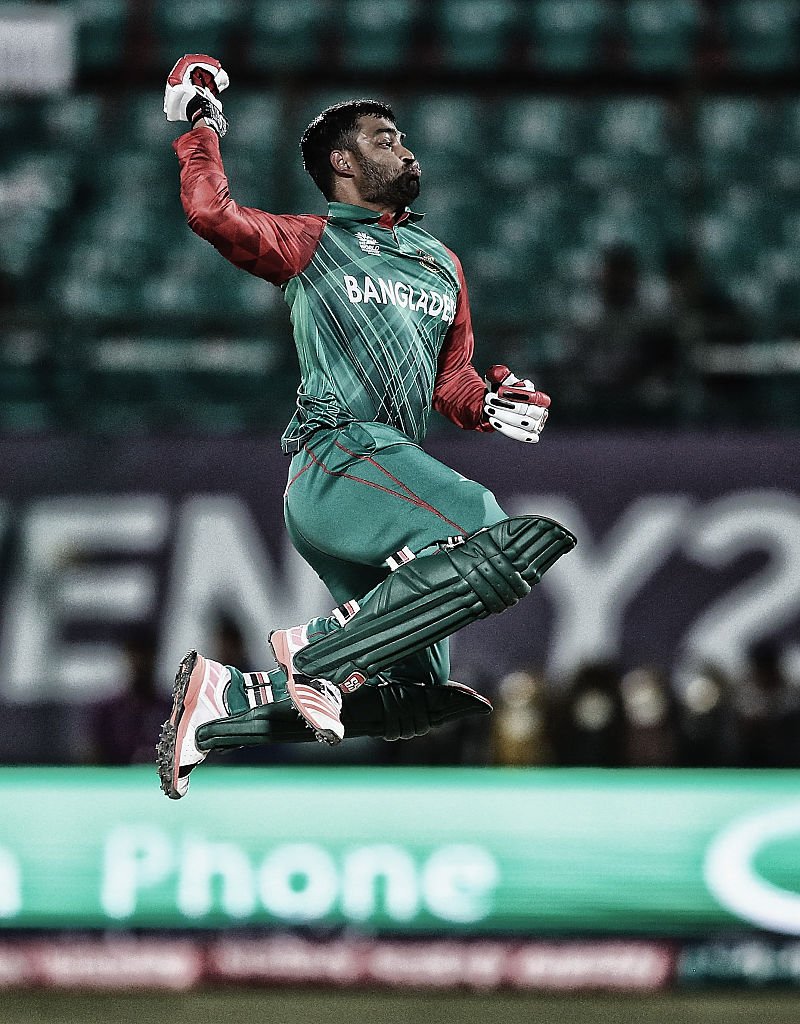 ICC's tweet photo. #ShotOfTheDay @TamimOfficial28 celebrates his century, becoming the first Bangladeshi to score a T20I century @oppo https://t.co/epiT6TENpb