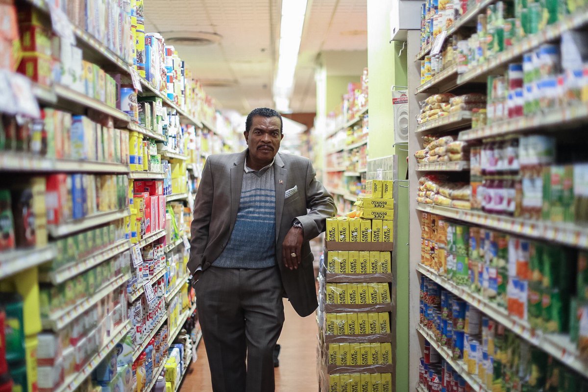 Associated Supermarket owner Gladwin Francis has been serving Chelsea neighborhood 27 years.