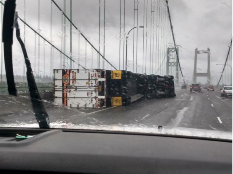 KIRO7Seattle's tweet image. #Traffic Viewer just sent in this picture of an overturned semi on the Tacoma Narrows WB. Backups growing