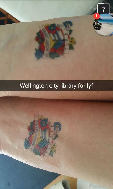 wcl_library's tweet photo. Some happy library fans with their WCL temporary tattoos at @WgtnPrideFest! #crossplatform #screenshot https://t.co/jAbhop6QZn