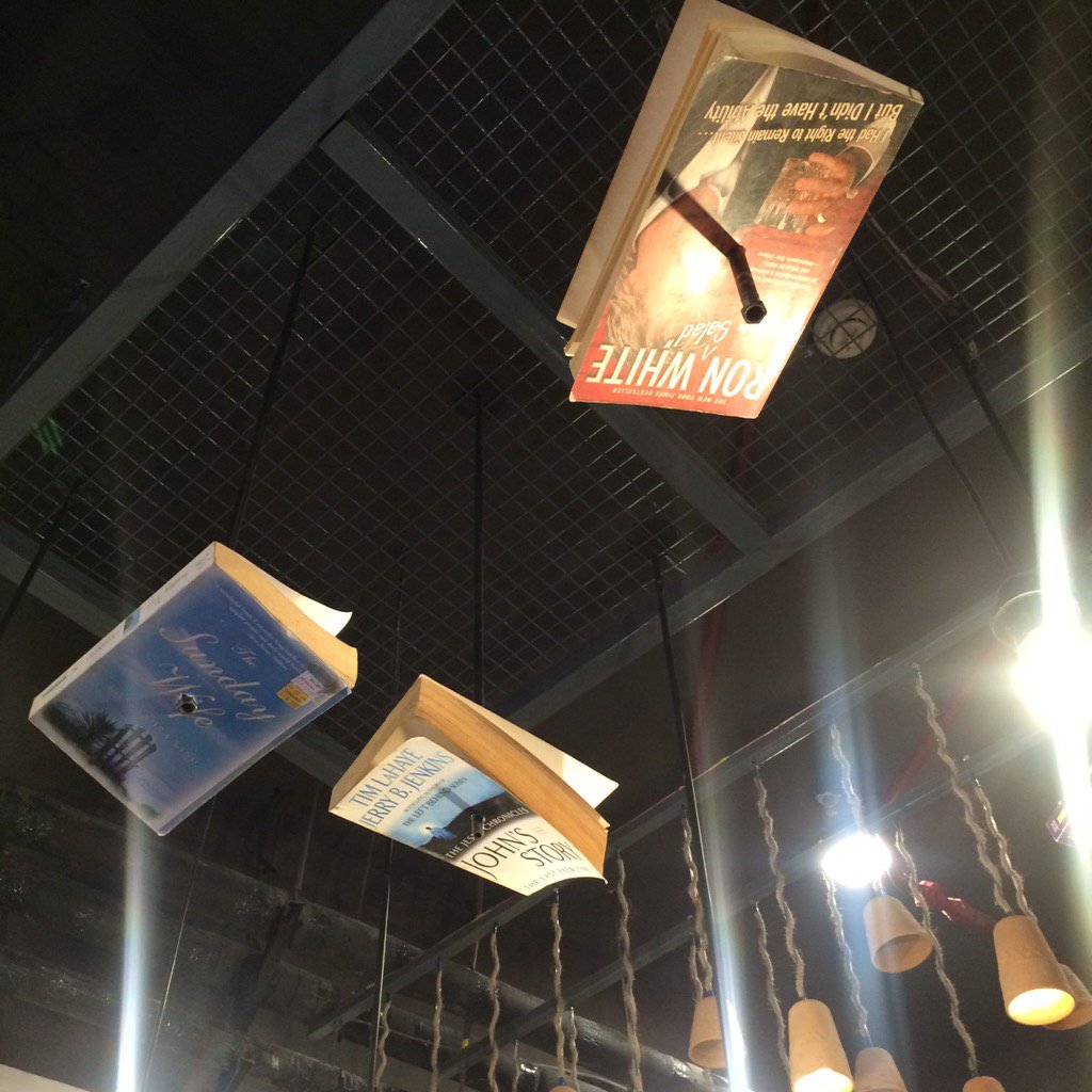 shr_ya's tweet photo. Death by books?  @Chaayos not being intolerant here but this ain't cool #BooksNeedsToBeRespected #ReThinkDesign https://t.co/oDTGWyhZF5