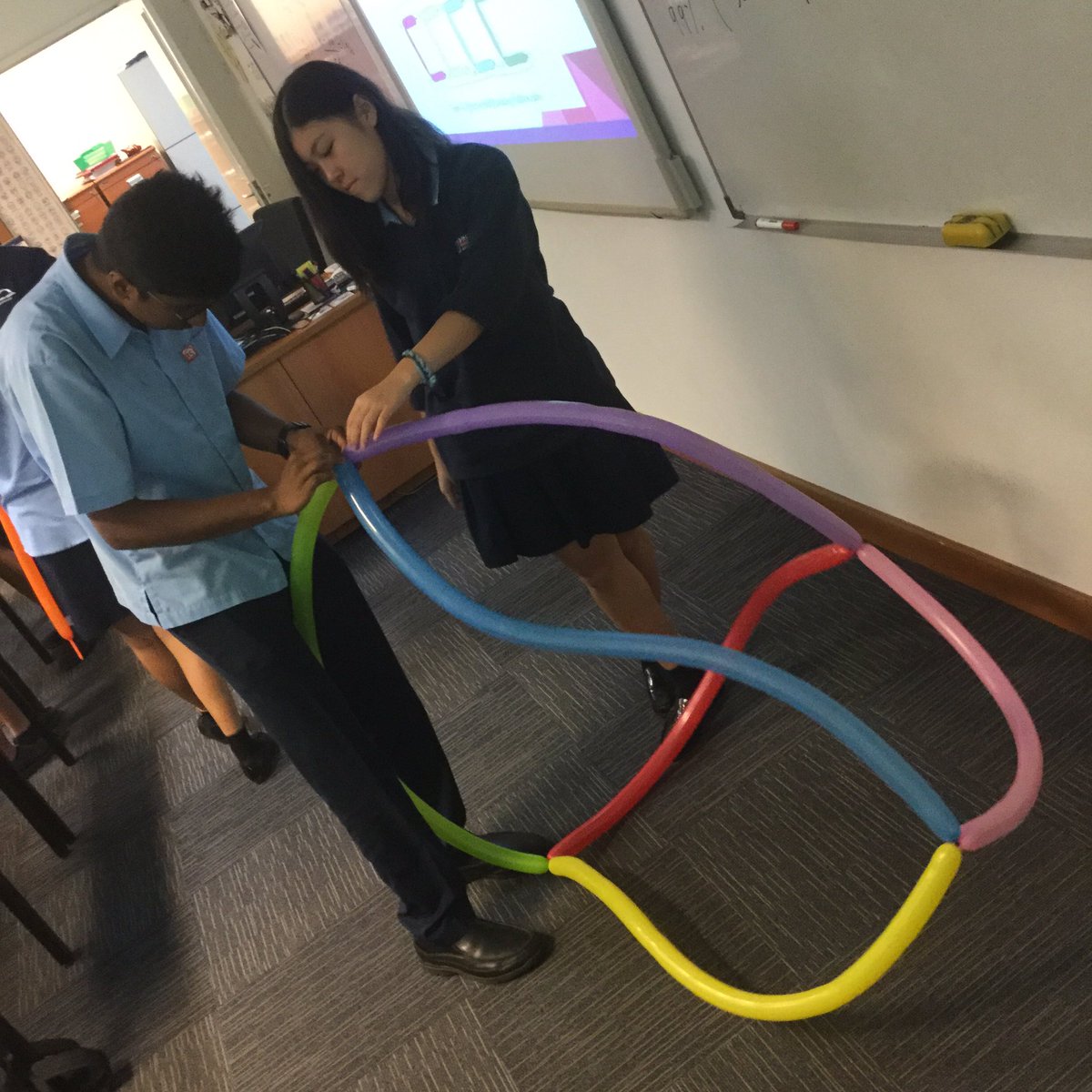 MikeShkurka's tweet photo. Kicking off @BSJ_Maths Wk @bsjjkt w/polyhedra balloon modeling &amp; murder mystery code breaking! #PiDay2016 #bsjbytes https://t.co/pi1wzXQNrW